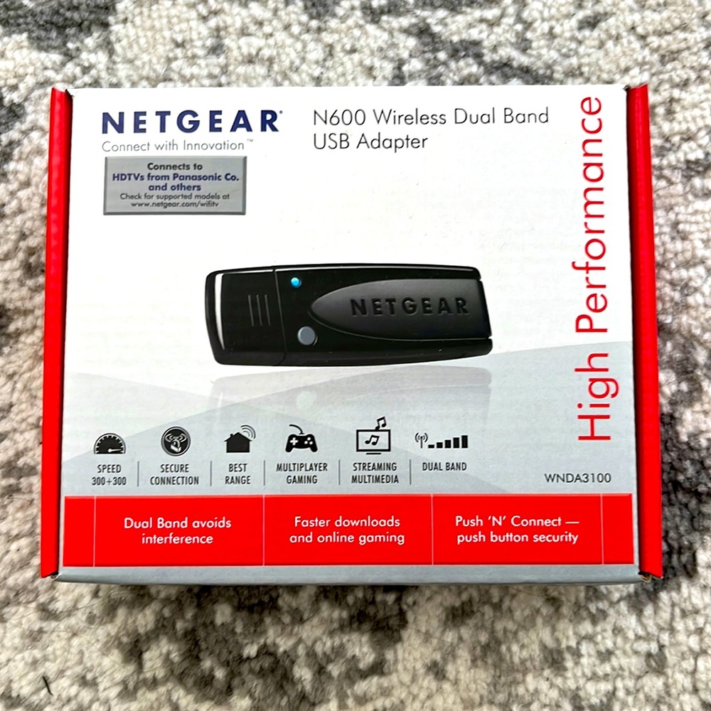Netgear N600 wireless Dual Band USB adapter. Cap is missing, has instructions